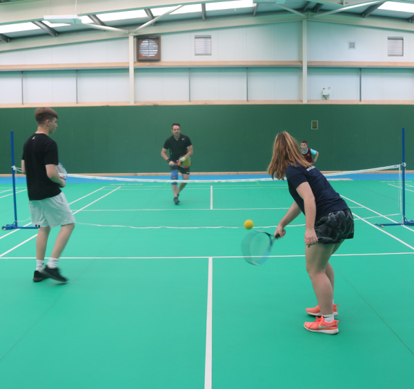 Short Tennis 4 people playing short tennis